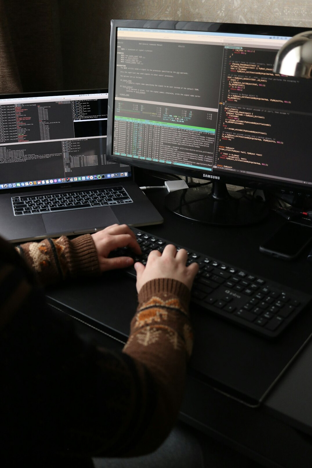 person studying code on screen